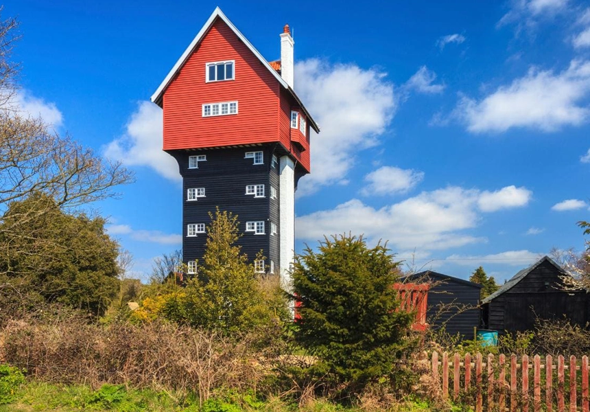 The 100th birthday of "The House in the Clouds" at Thorpeness, Suffolk. It is 70 feet high and was originally a water supply storage tank for Thorpeness village. Disguised as a house for aesthetic reasons, it is now available as a Holiday Let.