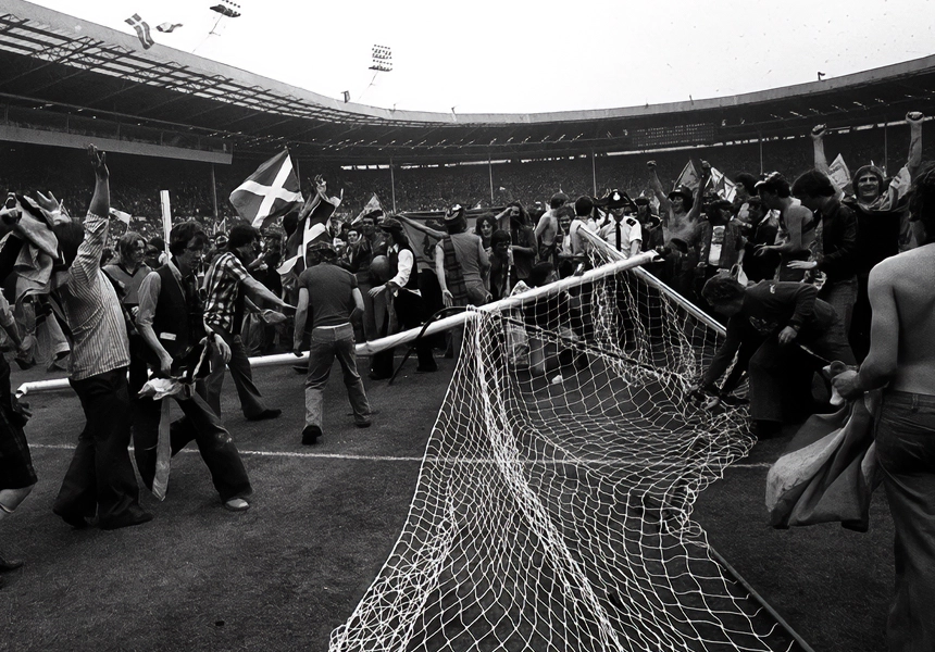 Scottish football fans caused at least £15,000 damage by breaking the goals and digging up the pitch at Wembley after Scotland beat England 2-1.