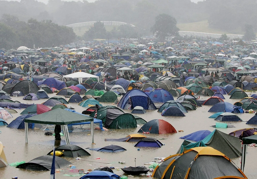 The Glastonbury Festival eventually got under way after suffering serious disruption when storms tore across its site at Pilton, Somerset.