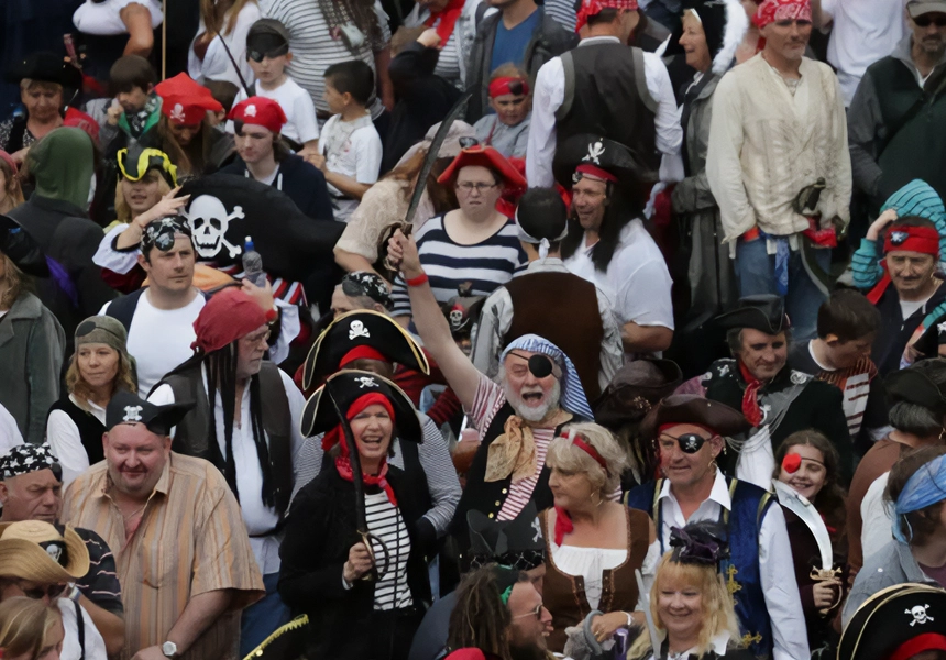 8,734 people in fancy dress assembled on Penzance promenade at 13:00 BST. The Guinness World Records later confirmed that Penzance now held the title for the largest gathering of pirates in one place.