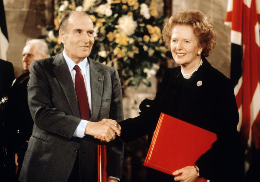 British Prime Minister Margaret Thatcher and President of France François Mitterrand sign the agreement to build a tunnel under the English Channel (Eurotunnel).