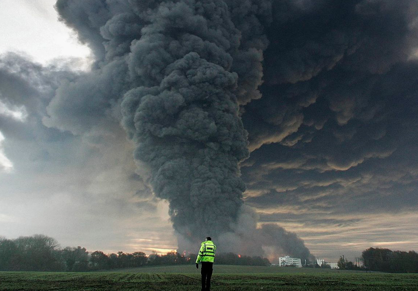 A huge fire continued to burn at Buncefield oil depot near Hemel Hempstead in Hertfordshire. It was the largest of its kind in peacetime Europe and the noise of the explosions could be heard as far away as the Netherlands.