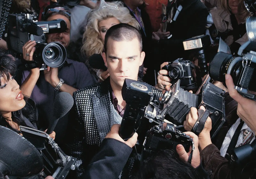 Robbie Williams released his debut solo album, Life Thru a Lens. The album features the hit single "Angels", which was released as the fourth single in December 1997 and became his biggest-selling single to date.