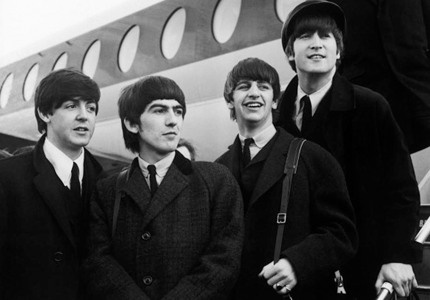 Beatlemania arrived in the United States when the Beatles landed in New York. Over 5,000 screaming fans greeted the Pan Am Flight 101 from London, UK to get a glimpse of John Lennon, Paul McCartney, Ringo Starr, and George Harrison.