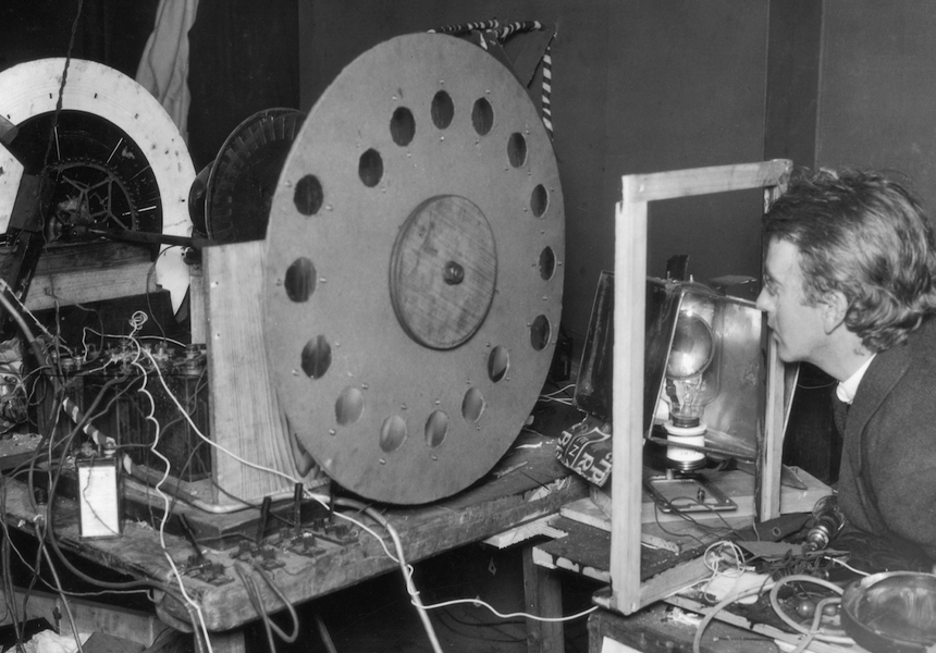 John Logie Baird gave a special public demonstration of television to members of the Royal Institution in London. Baird’s invention used mechanical rotating disks to scan moving images into electronic impulses.