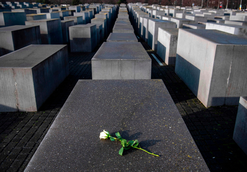 The first Holocaust Memorial Day was held in Britain on the anniversary of the liberation of Auschwitz by Soviet troops.